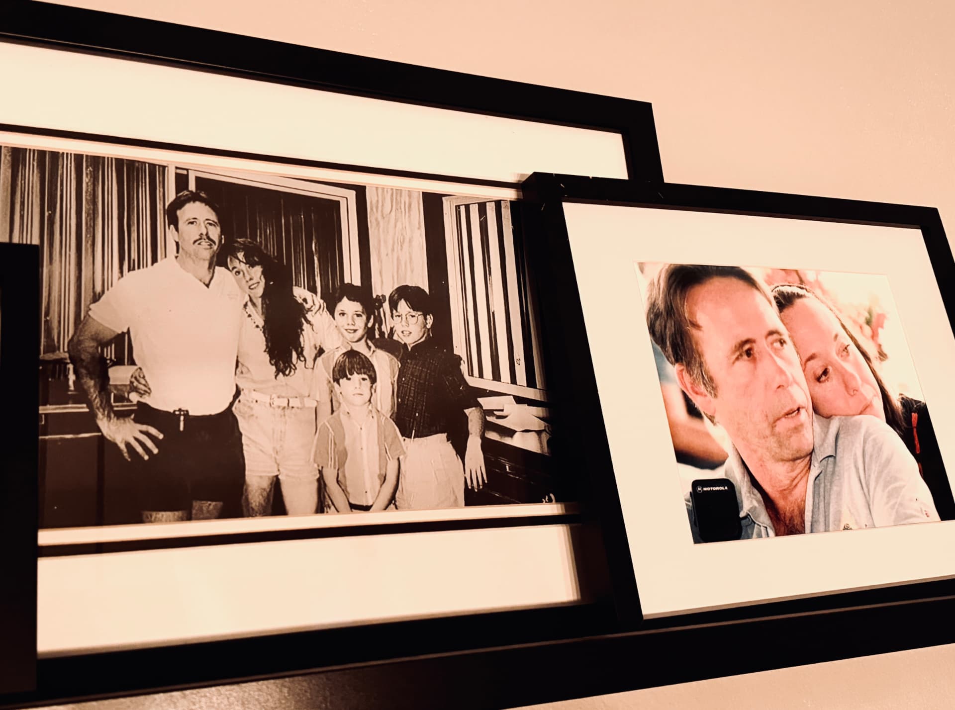 Framed family photographs of the Arthur family, including Austin Arthur's parents and brothers