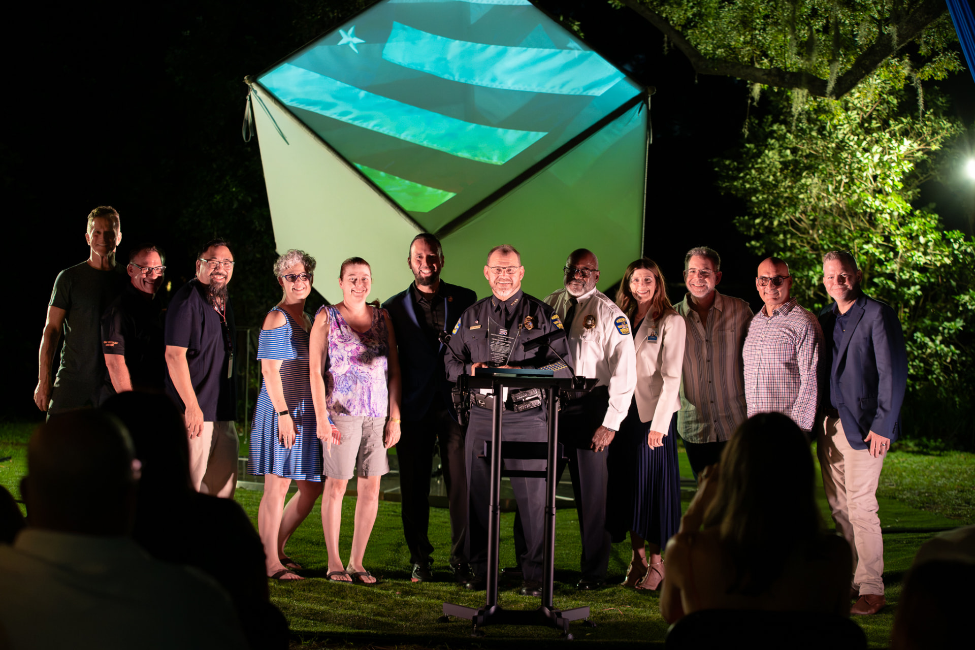Austin Arthur, Windermere Police Chief David Ogden, and West Orange County community leaders at the 2026 America 250 Achievement Award ceremony