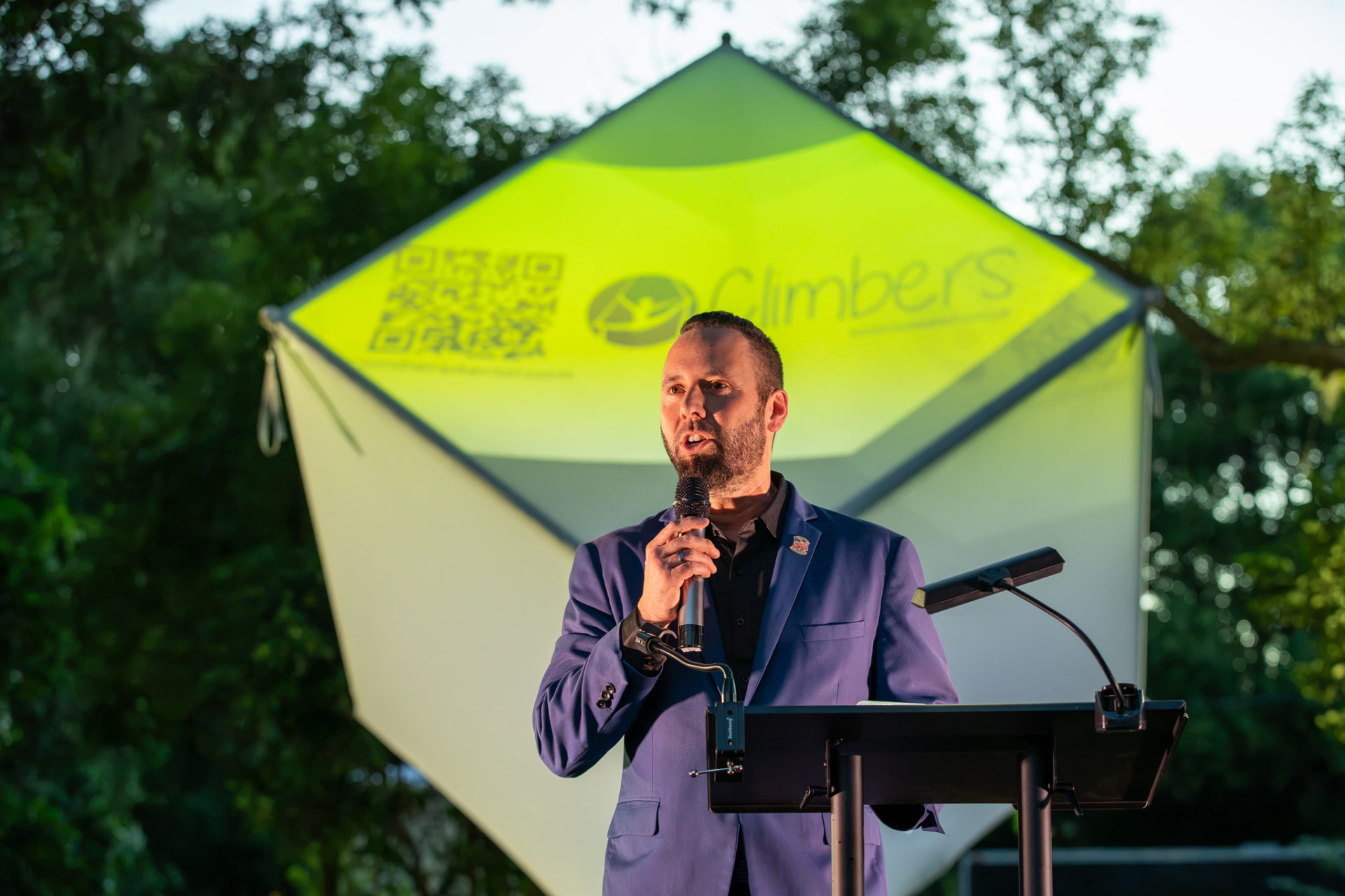 Austin Arthur delivering an America 250 address to the West Orange County community in Windermere