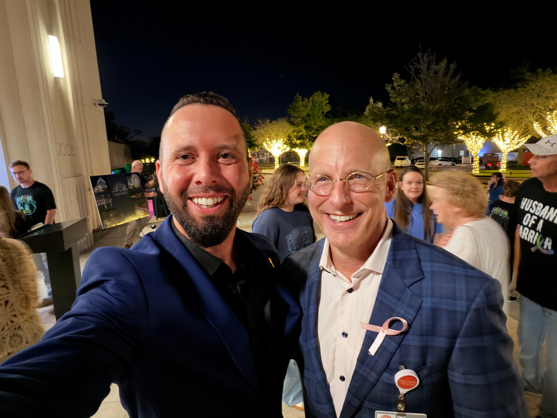 Austin Arthur with an Orlando Health physician at the Light Up MBC metastatic breast cancer awareness ceremony in Winter Garden