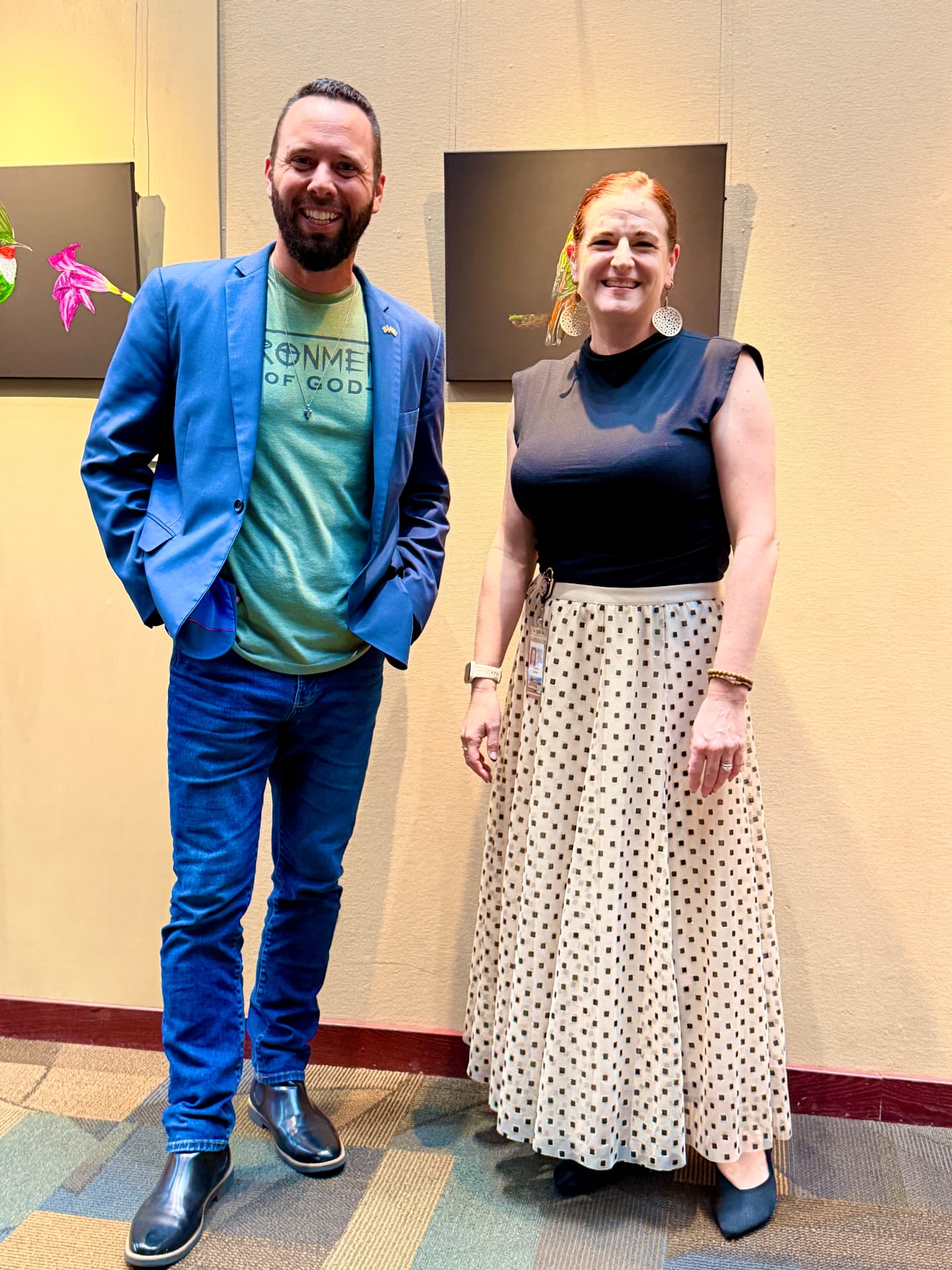 Austin Arthur with Vicki Landon, Orange County's Arts & Cultural Affairs Administrator, at an Orange County arts exhibit