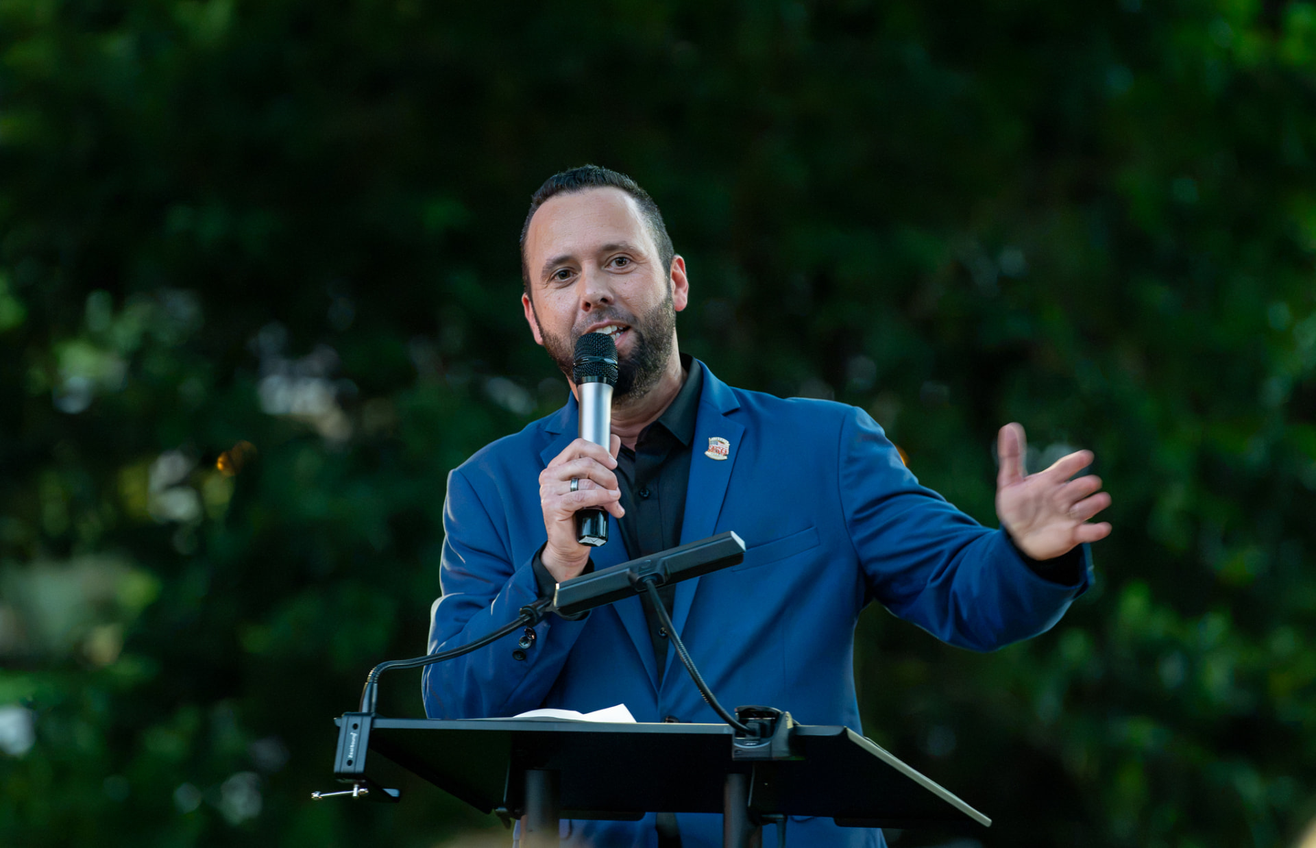 Austin Arthur speaking at the Rise Up America 250 community event in Windermere, Florida